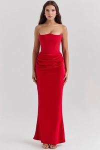 Detail of red off-shoulder A-line dress with corset bodice and pleated shimmering fabric