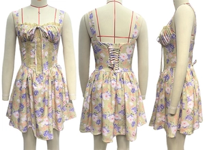 Lace-up back detail and floral corset design of this yellow mini dress for women