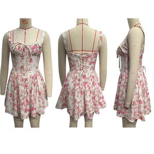 Detailed views of a floral lace-up mini dress featuring corset-style back and A-line skirt
