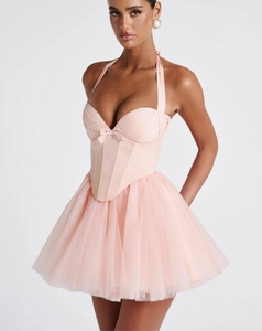 Detail of light pink halter mini dress with corset bodice and tiered tulle skirt layers