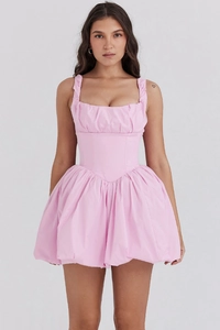 Detailed front view of pink bubble skirt mini dress with corset waist and square neckline