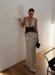 Chic halter neck polka dot maxi dress with elegant black lace waist splicing detail