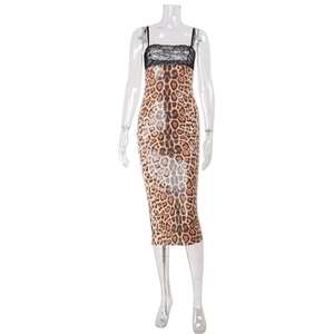 Detail of leopard print sequins and black lace trim on a slim fit evening dress