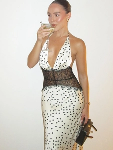 Polka dot satin dress with lace waist and deep V-neckline for elegant vacation wear