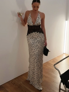 Elegant polka dot maxi dress with lace waist patchwork and halter neck design