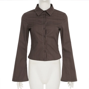 Detail of French vintage brown striped shirt featuring elegant bell sleeves and collar