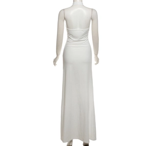 Detail view showing backless design and halter neckline of the white slim fit maxi dress