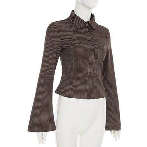 Detailed side view of vintage striped cotton shirt with distinctive flared bell sleeves