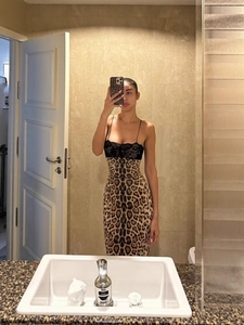 Chic leopard print maxi dress with black lace splicing and slim straps for party wear