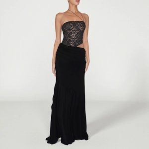 Close-up of elegant black floral lace tube top with delicate asymmetric straps