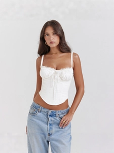 White corset style camisole with lace trim and lace-up front detail for women