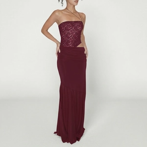 Close-up of wine red lace bodysuit with floral patterns and waist cutout details