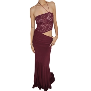 Detail of dark red lace off-shoulder top and matching mermaid skirt for party
