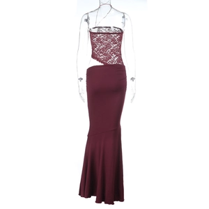 Close-up of elegant burgundy lace off-shoulder top and maxi skirt on a white background