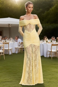 Close-up of elegant off-shoulder lace texture and pleated details on this yellow maxi dress