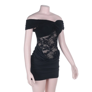 Detail of off-shoulder black dress with sheer lace bodice and ruched skirt design