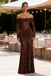 Detail of elegant off-shoulder brown lace and pleated fabric on evening long dress