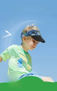 Close-up of kids sun visor with blue football print showing UPF 50 plus UV protection