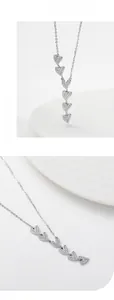 Detail showing 925 sterling silver heart pendant with shimmering zircon pavé stones