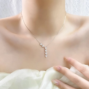 Elegant 925 sterling silver heart necklace with zircon pendant on model neck