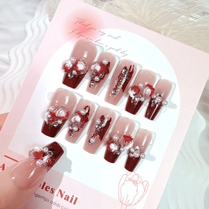 3D rose and pearl gradient red press-on nails in long coffin shape on display card