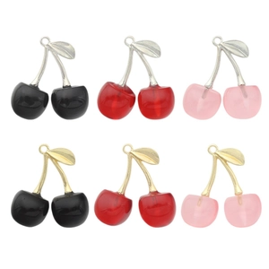 DIY cherry pendants in multiple colors with gold and silver leaf charms for jewelry making