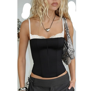 Detail of black corset top with white lace trim and structured front stitching