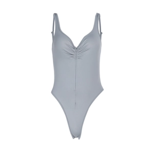 Detail of blue-grey bodysuit featuring front zipper, ruched chest, and high cut design