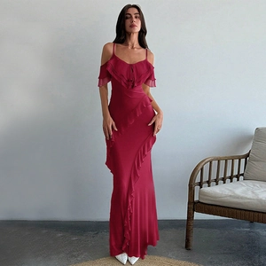 Detail of elegant burgundy off-shoulder dress with ruffled accents and flowy fabric