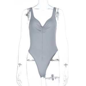 Detail of grey sleeveless bodysuit with front zipper closure and V-neckline ruffles