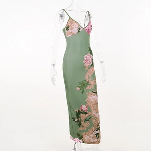 Detailed close-up of a vintage floral print midi dress with sage green and pink peonies