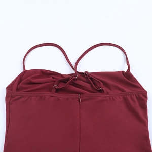 Detail of adjustable straps and invisible back zipper on wine red A-line party dress