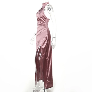 Detail view of rose gold satin dress showing elegant ruched texture and high side slit