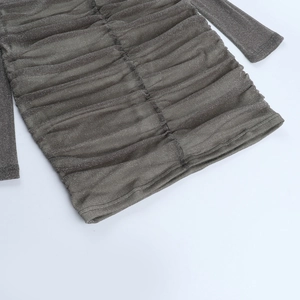 Detail of dark grey shimmering fabric with elegant horizontal ruching and pleated texture
