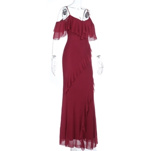 Detail of burgundy off-shoulder evening dress with tiered ruffles and lace sleeves
