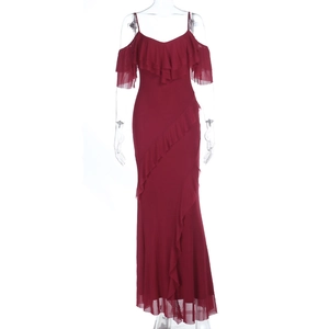 Detail of burgundy off-shoulder gown featuring layered ruffles and sheer chiffon hemline