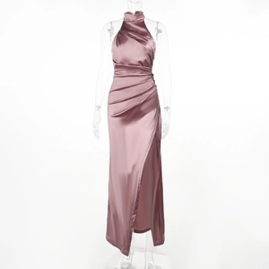 Detail of cross-pleat design and neck strap on an elegant satin slit party dress
