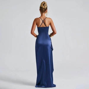 Detailed back view of a slim navy satin dress with criss-cross straps and elegant draping