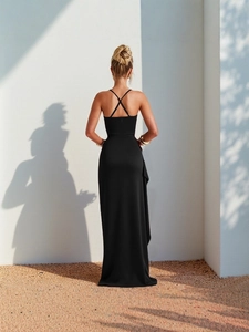 Elegant black off-the-shoulder maxi dress with criss-cross back straps and a-line cut