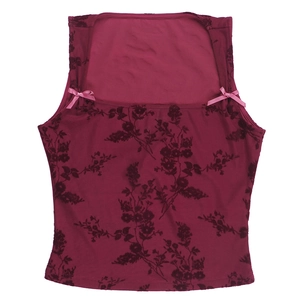 Detail of burgundy camisole with vintage floral flocking and pink ribbon bows