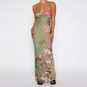 Detail of the elegant sage green floral pattern on the slim fit mesh long dress