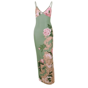 Detail of sage green floral A-line dress with shimmering fabric and Baroque patterns