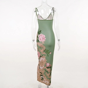 Detail view of avocado green strap dress with floral baroque print on the back side