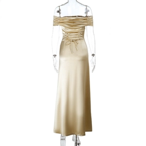 Detailed back view of champagne satin gown showing adjustable lace-up corset closure