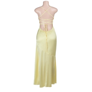 Detail of cross-back lace-up design on a pale yellow satin backless maxi dress