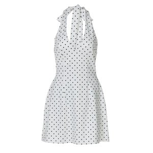 Detail of white halter neck mini dress with black polka dots and sexy deep V-neckline