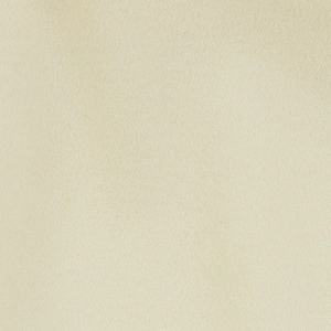 Detailed macro view of the cream-colored knit fabric showing fine textile texture and soft finish