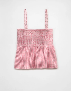 Detail of red gingham crop top featuring smocked elastic bodice and adjustable straps