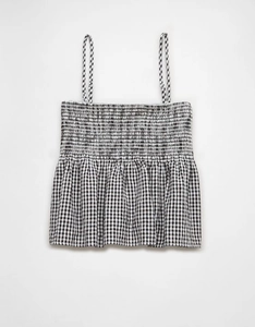 Detail of smocked elastic chest and gingham pattern on the cropped camisole top