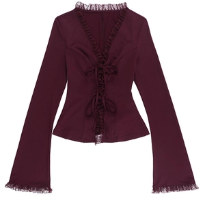 Detail of burgundy chiffon blouse showing lace trims, bell sleeves and tie-up front closure